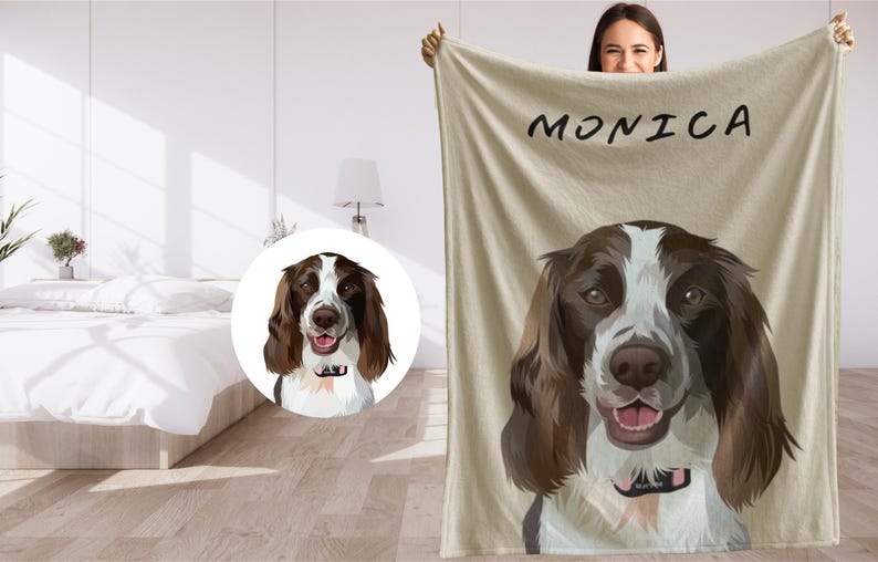 May include: A personalized fleece blanket with a brown and white dog illustration and the name "MONICA" printed in black text.