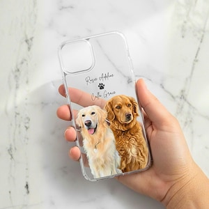 May include: Clear phone case featuring a custom portrait of two Golden Retrievers. The case has the names "Rosie Adeline" and "Calla Grace" printed in script, along with a paw print. The dogs are depicted with detailed fur and expressive faces.