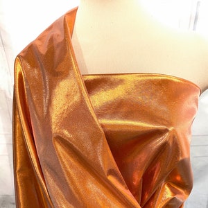 Tissue Lame fabric Orange/white ..44 inches..crafts, costume, decor, doll clothing, gift wrap, hair bows, clothing