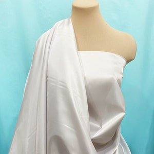 Poly Lining fabric 58 inches wide..LIGHT GRAY.. . used for lining  jackets, skirts, dresses. vests, soft, light weight
