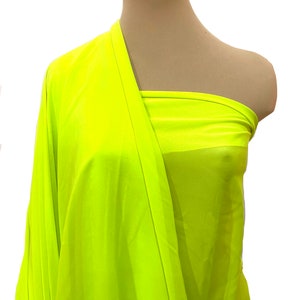 Hi-Multi Chiffon fabric NEON LIME YELLOW   60" wide sold by the yard.. formal..pageant...bridesmaids gowns..decor..curtains