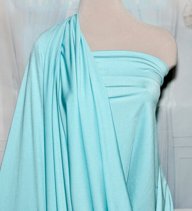costume gymnastics 4 way stretch.. Milliskin Spandex Lycra Fabric Aqua . pageant by the yard dance formal wear.