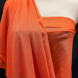 Power mesh stretch fabric, semi sheer, 4 ways stretch.. Paprika Orange . 58 " wide.. dance, pageant, formal, costume,