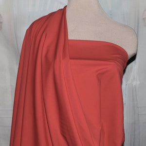 Spandex high performance tricot ..matte finish.. 4 ways stretch..SPECTRUM RED , uses leotards, gymnastics, pageant, dance, shorts