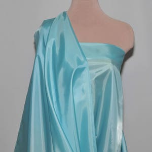 Poly Lining fabric 58 inches wide..Light Turquoise  used for lining  jackets, skirts, dresses. vests, soft, light weight