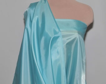 Poly Lining fabric 58 inches wide..Light Turquoise  used for lining  jackets, skirts, dresses. vests, soft, light weight