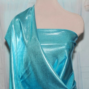 Mystique Spandex Hawaii/baby blue   .. dance ..skate... gymnastics.. twirl  ..pageant   cheer bows .. posting suits BTY