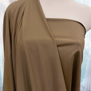 Spandex high performance tricot ..matte finish.. 4 ways stretch..SADDLE BROWN .. uses leotards, gymnastics, pageant, dance, shorts
