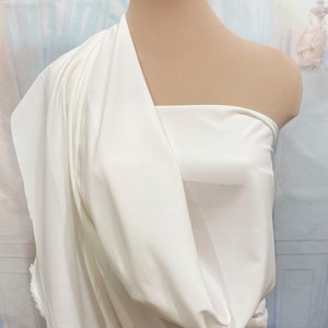 Stretch Polyester Lining Fabric LIGHT IVORY  .. 60&quot; ... used for lining garments, home decor, crafts, costumes