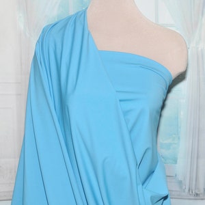 Spandex high performance tricot ..matte finish.. 4 ways stretch.. POWDER BLUE  .. uses leotards, gymnastics, pageant, dance, shorts