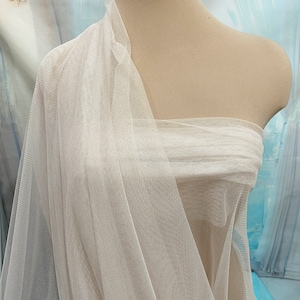 English Netting fabric.. 54 wide   100% poly..BLUSH  . sold by the yard.. wedding dress, formal wear, home decor