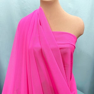 Power mesh stretch fabric, semi sheer, 4 ways stretch.. Neon Pink.. 58 &quot; wide.. dance, pageant, formal, costume,