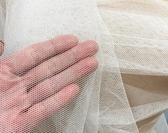 English Netting fabric.. 54 wide   100% poly. WHITE . sold by the yard.. wedding dress, formal wear, home decor