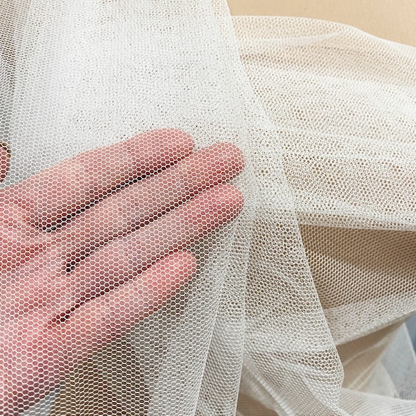 English Netting fabric.. 54 wide   100% poly. WHITE . sold by the yard.. wedding dress, formal wear, home decor