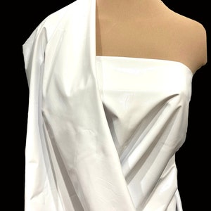 White  PU vinyl  fabric, 58"  4 ways stretch sold by the yard.. ..costumes, casual wear, jackets, theater, crafts