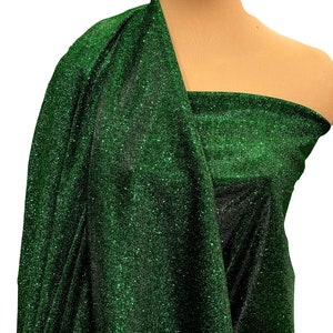 Lurex HUNTER GREEN .. 100% white backing.. stretch ... light weight, glittered in green  .. holiday wear, formal , prom .. suits..