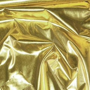 Tissue Lame fabric Gold  ..44 inches..crafts, costume, decor, doll clothing, gift wrap, hair bows, clothing