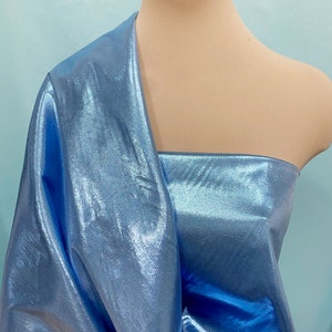 Tissue Lame fabric Lt. Blue  /white ..44 inches..crafts, costume, decor, doll clothing, gift wrap, hair bows, clothing