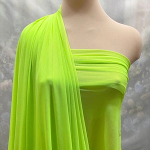 Neon Lime/chartreuse Power mesh stretch fabric, semi sheer, 4 ways stretch..  . 58 &quot; wide.. dance, pageant, formal,