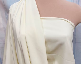 Stretch Polyester Lining Fabric IVORY .. 60" ... used for lining garments, home decor, crafts, costumes