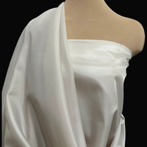 Poly Lining fabric 58 inches wide..Champagne  used for lining  jackets, skirts, dresses. vests, soft, light weight