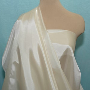 Poly Lining fabric 58 inches wide..CREAM  .. used for lining  jackets, skirts, dresses. vests, soft, light weight