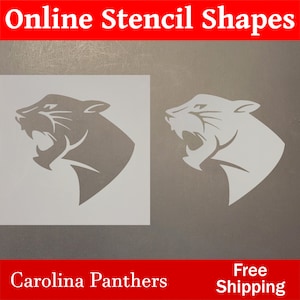 May include: A stencil of a Carolina Panthers logo. The logo is a black and white silhouette of a panther's head with an open mouth. The stencil is on a white background. Free shipping.
