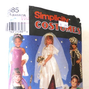 May include: Simplicity Costumes pattern #385, featuring five different costumes for girls. The pattern includes a bride, a witch, a fairy, a flapper, and a cowgirl. The pattern is printed on a white background with a blue border.