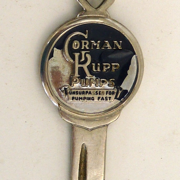 Vintage Corman Rupp Pumps advertising stainless steel key chain accessory