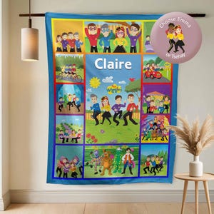 May include: A vibrant, rectangular blanket with cartoon illustrations of The Wiggles characters. The blanket has a blue border and the name "Claire" in white. A pink circular graphic reads "Choose Emma or Tsehay".
