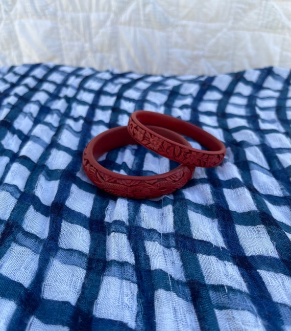 Set of 2 Red Chinese Cinnabar bangles.