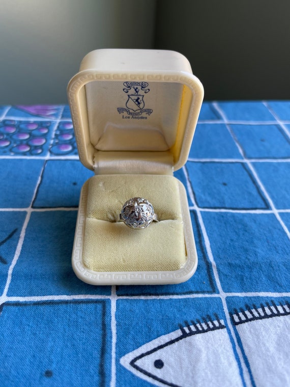 Vintage white gold starburst diamond ring.