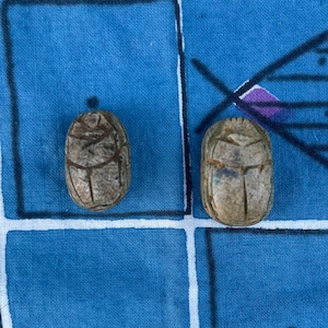 2 carves Scarabs beads