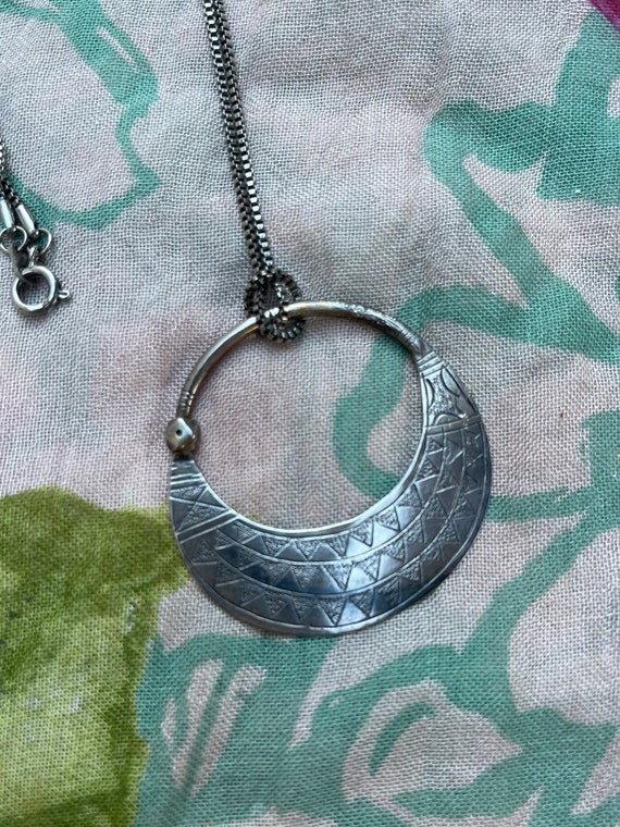 Silver Tribal necklace.