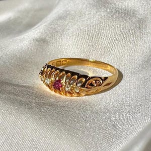 18CT antique Ruby and diamond five stone ring