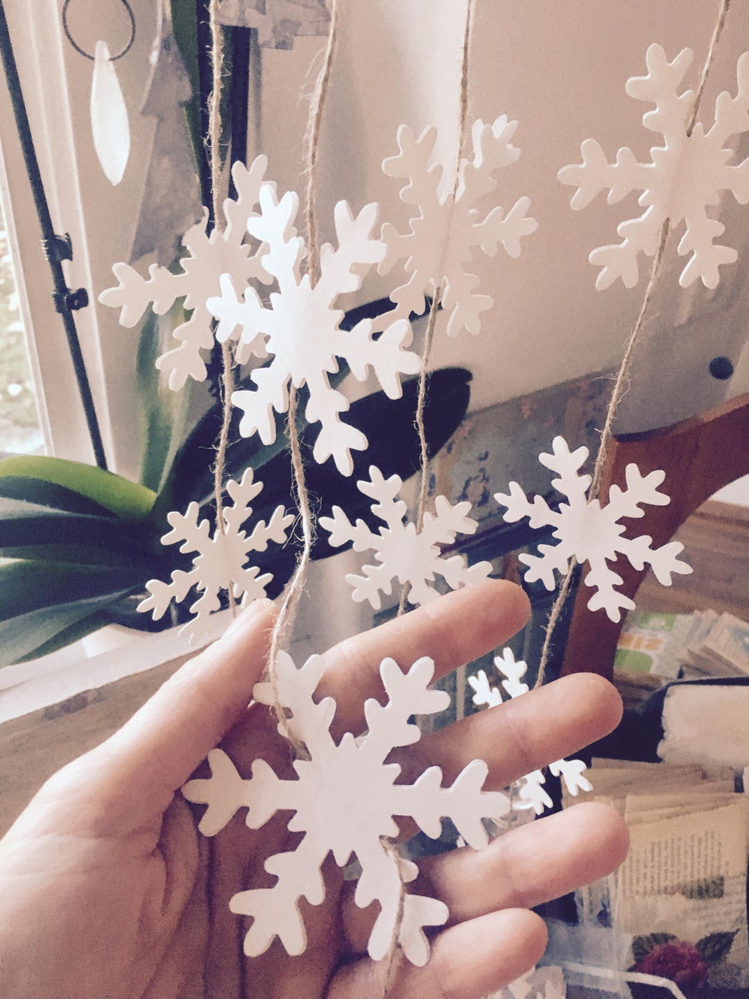 Decorating the Mantel for Winter with Book Page Snowflakes - An  Extraordinary Day