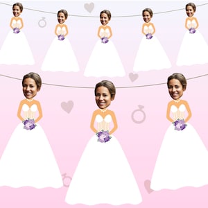 May include: A string of white bridal dress cutouts with purple flowers and a ring design. Each cutout has a space for a photo to be inserted.