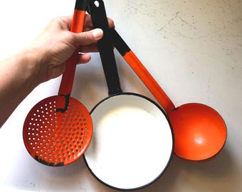 antique vintage enamel orange set kitchen tools strainer ladle little frying pan black and white enamel orange enamel