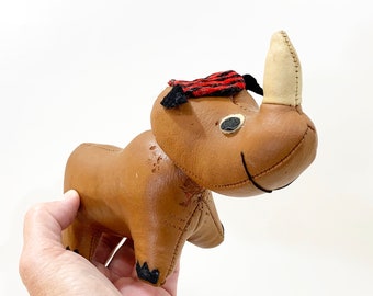 toy Rhinoceros wearing beanie made in japan vintage leather stuffed plush midcentury 1950s striped red black  Rhino toy