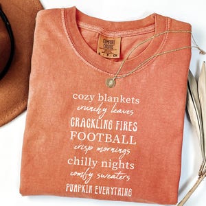Cozy Blankets Crunchy Leaves Crackling Fires Football Shirt, Cute Fall ListTees, Womens Halloween Shirt, Thanksgiving Gifts, Comfort Colors®