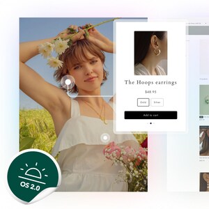 May include: A woman wearing a white dress and holding a bouquet of flowers. She is wearing gold hoop earrings. The earrings are available for purchase in gold or silver for $48.95. The text "The Hoops earrings" is displayed on the product page.