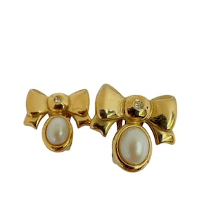 Vintage Collectible Nina Ricci Rare Clip on earrings.