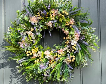 Beautiful pinks, lilac & beiges faux floral wreaths. 60cms.