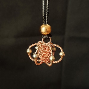 Colgante armonizador tensor con cristal de cuarzo