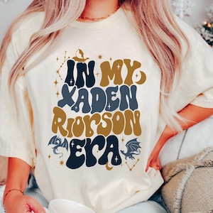 a woman sitting on a couch wearing a t - shirt with the words in my