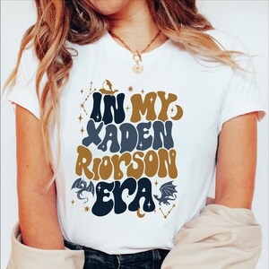 a woman wearing a t - shirt that says, i am my raden robinson