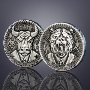 May include: Two silver-toned coins with a bull and bear design. The bull coin has the word "BULLISH" inscribed on the edge and the bear coin has the word "BEARISH" inscribed on the edge.
