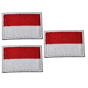 May include: Three rectangular embroidered patches featuring the flag of Indonesia. Each patch has a red upper half and a white lower half, with a white border. The patches are arranged on a white background.