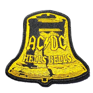 May include: Black and yellow embroidered patch of a bell with the text "AC/DC" and "Hells Bells" on it.