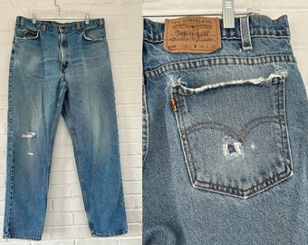 1990's 38 x 32 Orange Tab Levi's - Distressed